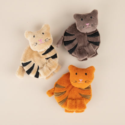 Three fabric cat tape measurers' in orange, beige, and gray on a white background