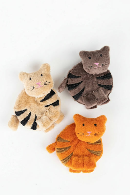 Three fabric cat tape measurers' in orange, beige, and gray on a white background