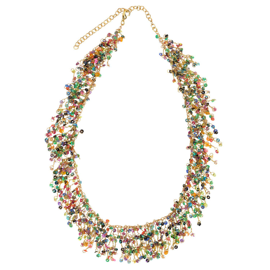 Multicolor sequin beaded necklace with gold metal rings and twisted metal on a white background