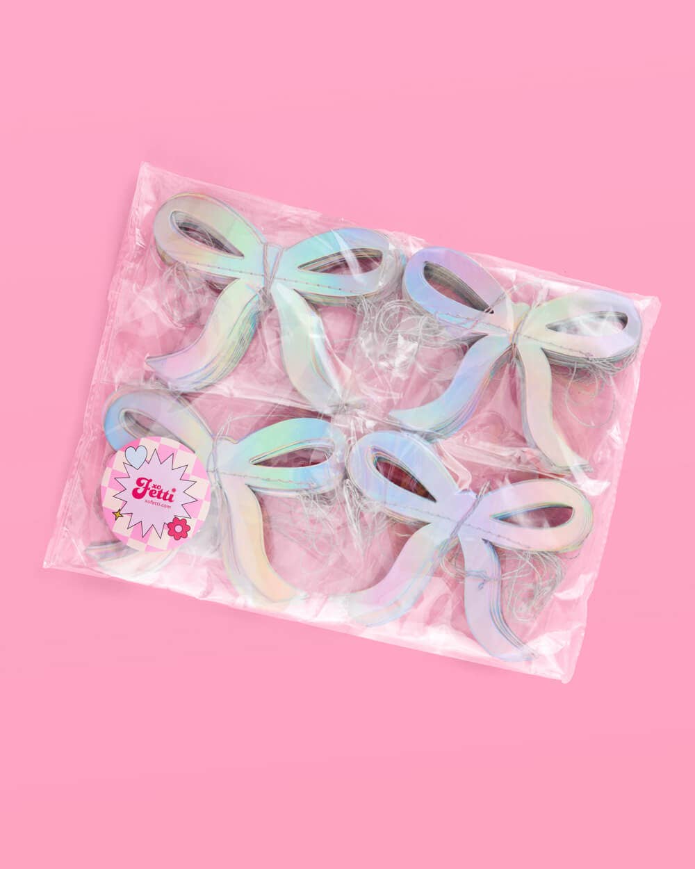 Glam pink bow garland with iridescent foil finish—4 strands, 12' each—perfect for adding sparkle to bridal showers, bachelorette parties, and baby showers.