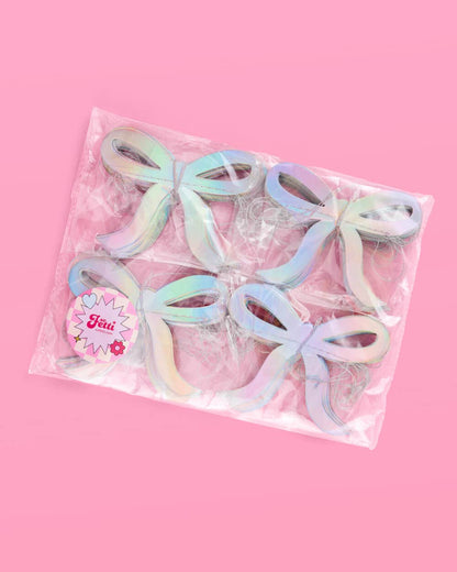 Glam pink bow garland with iridescent foil finish—4 strands, 12' each—perfect for adding sparkle to bridal showers, bachelorette parties, and baby showers.