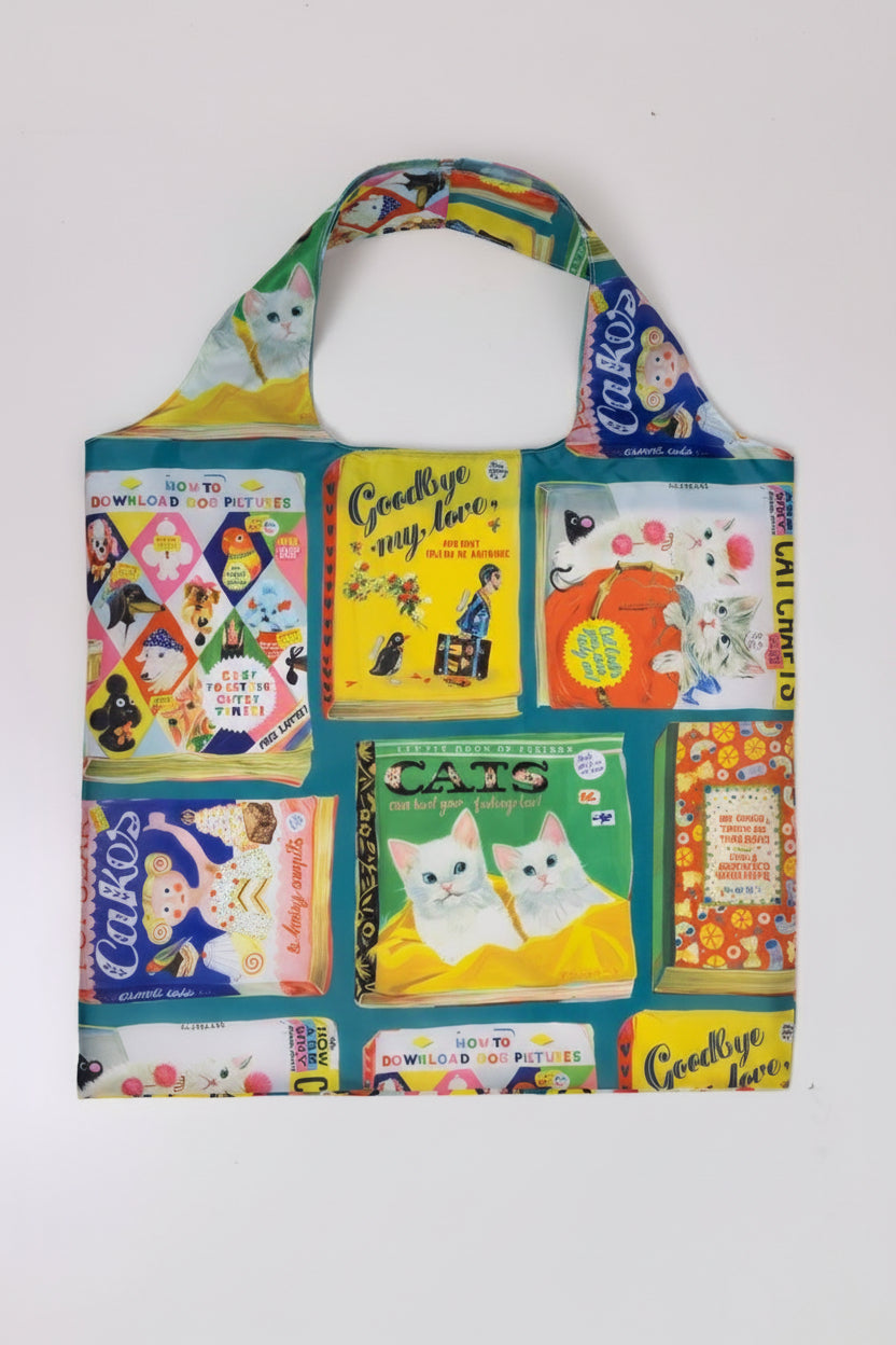 A multicolored tote bag featuring vintage-inspired book cover designs with various playful and sarcastic phrases.