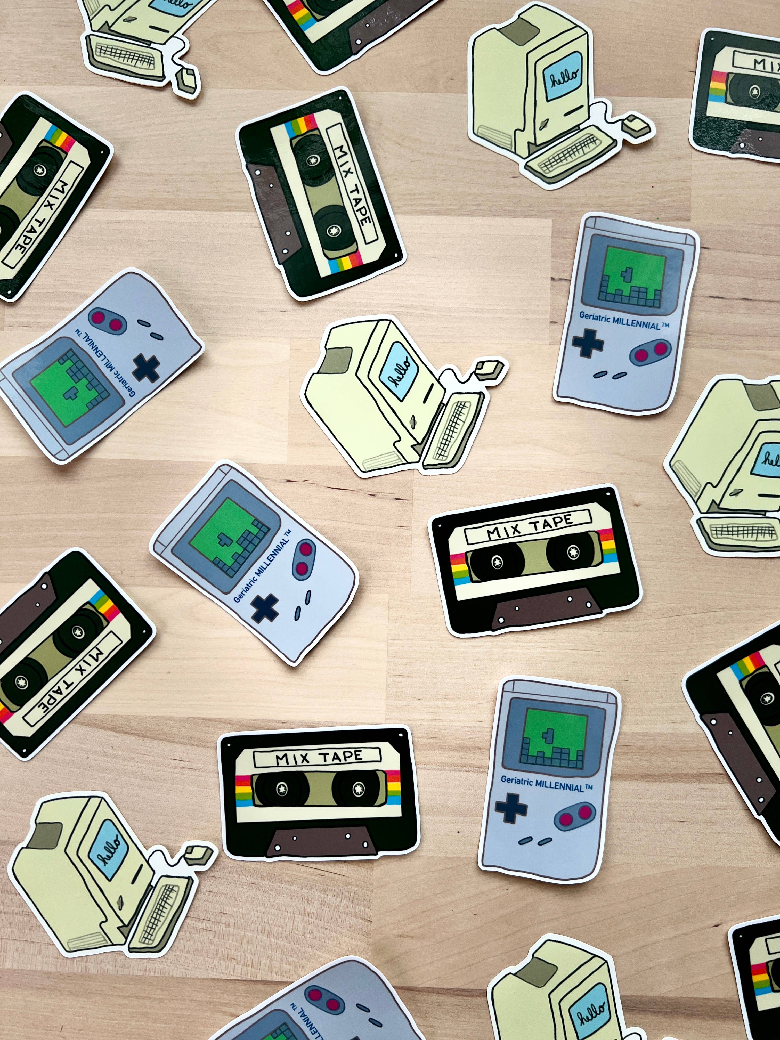 Vintage-inspired music sticker with other vintage style stickers on a desk top
