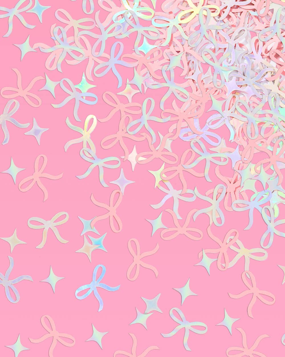 Tying the Knot confetti with pink bows and iridescent foil sparkles for bridal celebrations and gift boxes