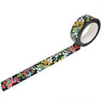Roll of Meadow inspired washi tape with vibrant colors and flower embellishments 