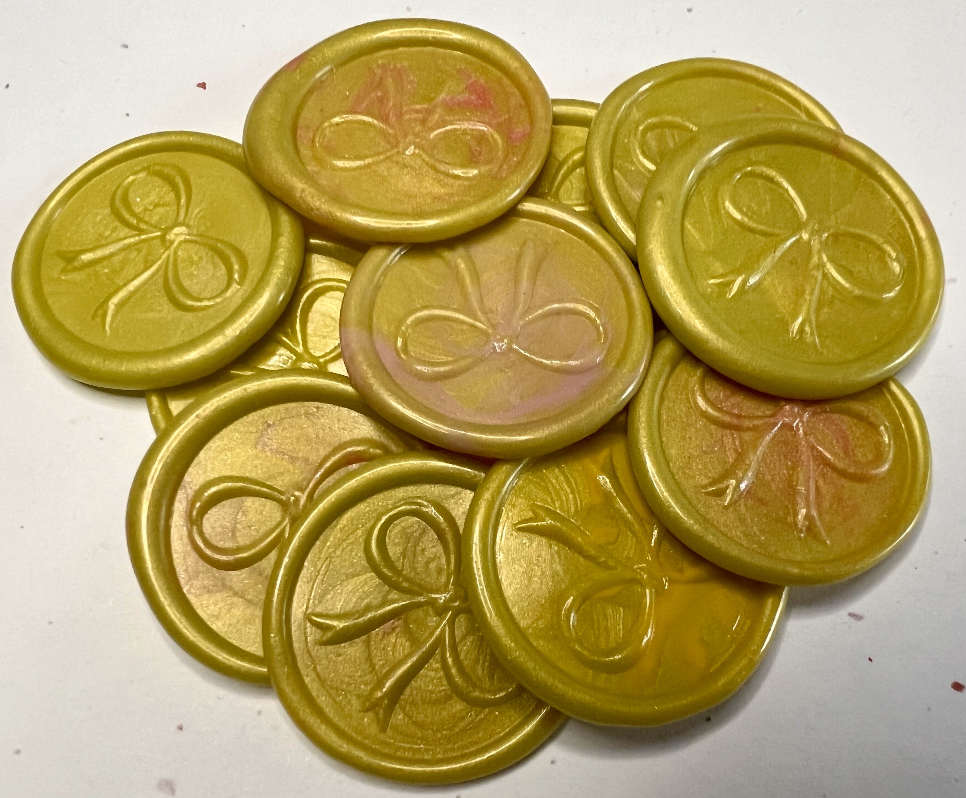 Elegant chartreuse bow wax seal tags for gift wrapping, offering sophistication and charm for every occasion.
