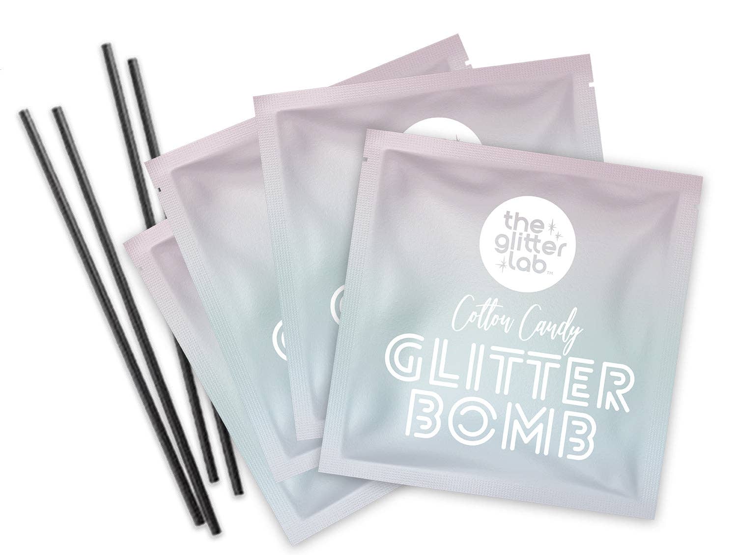 Close up of four Glow Glitter Bombs in iridescent pastel shades (Pink, Blue, Green, Purple), with stir sticks included.
