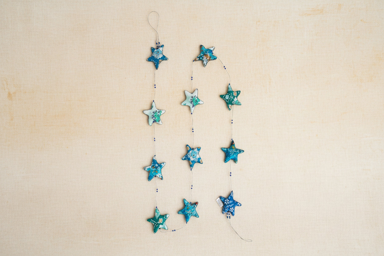 The Embroidered Star Garland on a white background