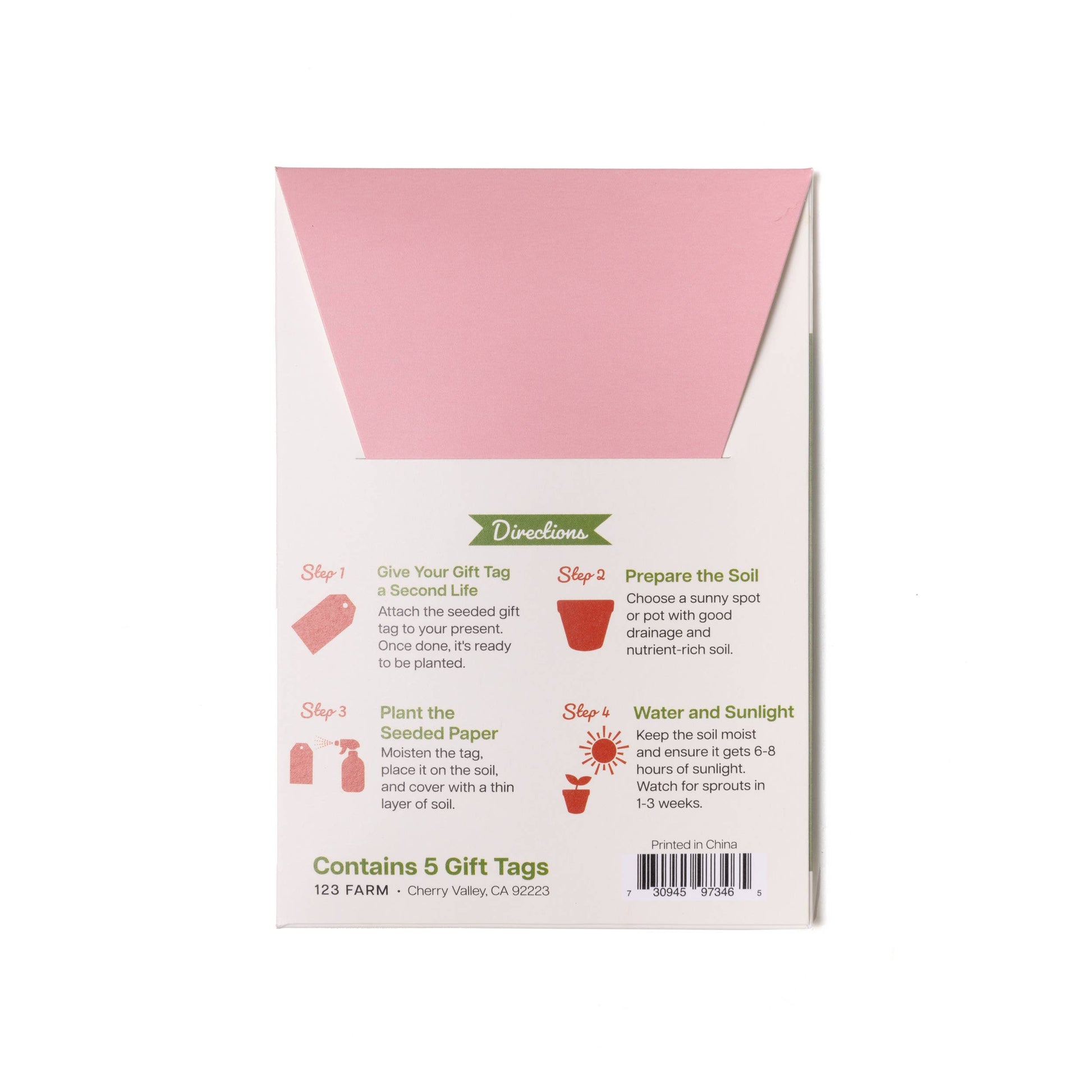Seeded paper gift tag packaging with pink and white design on a white background