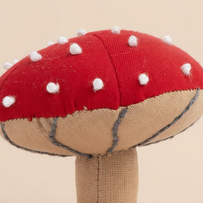 Close-up of stitched mushroom cap and soft-textured stem