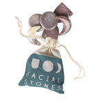 Set of six polished face massage stones with natural marbling