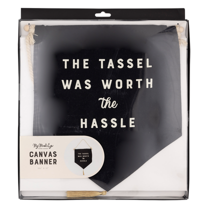 Graduation canvas banner with "The Tassle Was Worth the Hassle" text, wood dowel, and gold tassel