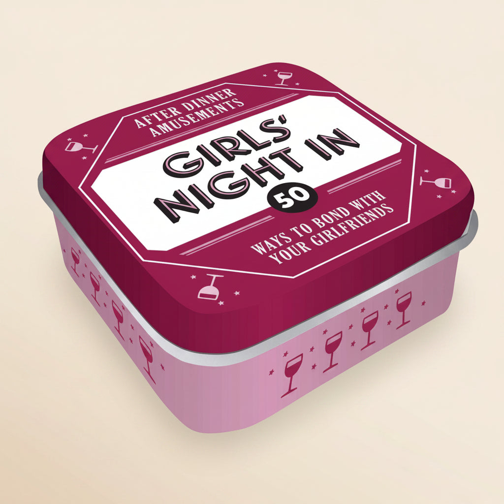 Pink tin box with 'Girls' Night In' text and wine glass designs on a white background