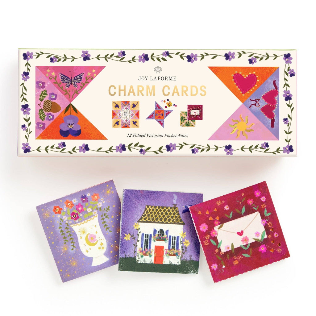Box of Joy Lafonè charm cards with colorful designs on a white background
