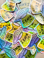 Pile of "I Knew It" UFO sticker for alien enthusiasts and conspiracy theorists