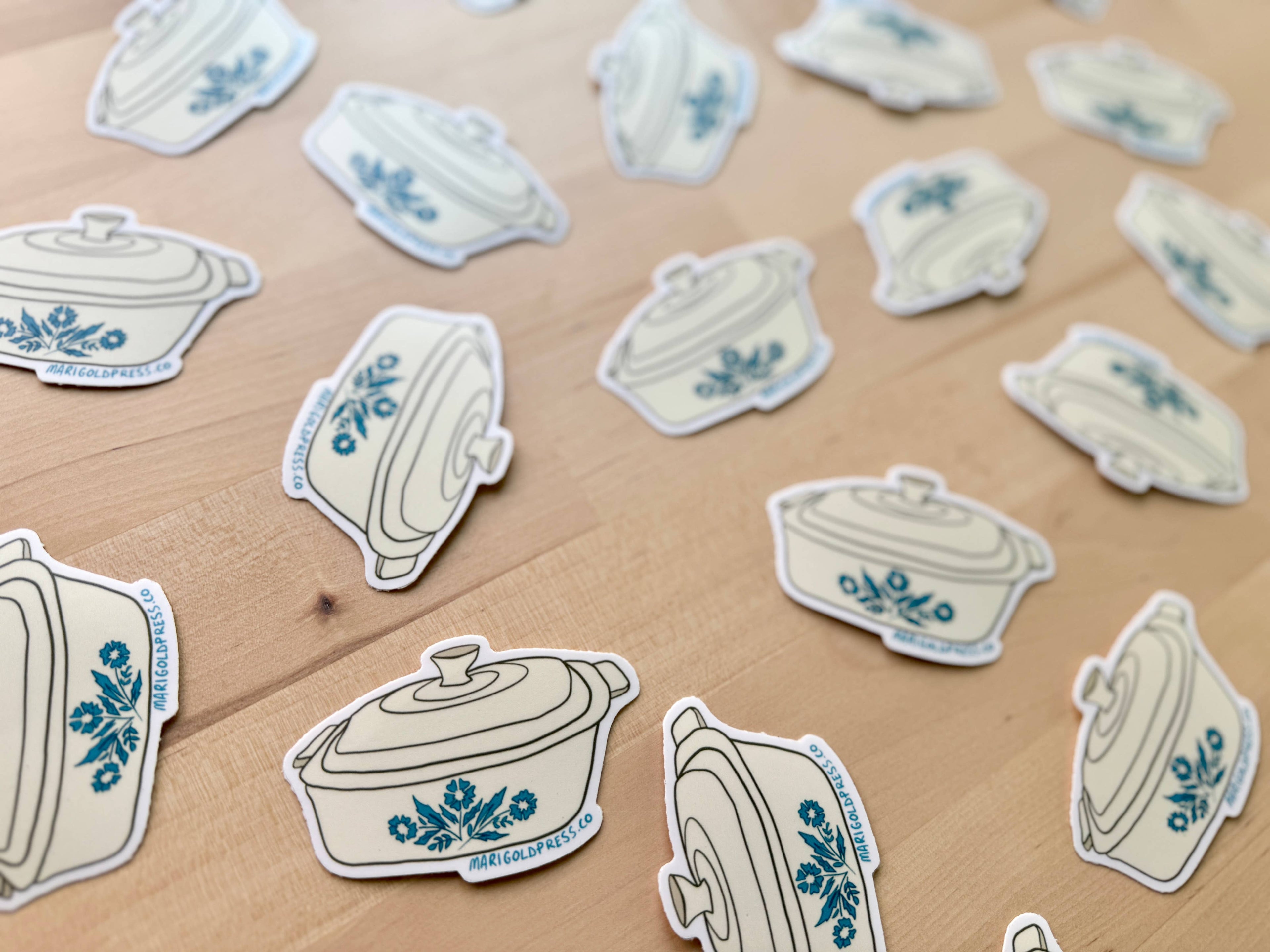 Flat lay of Retro Kitchenware sticker on a wooden counter