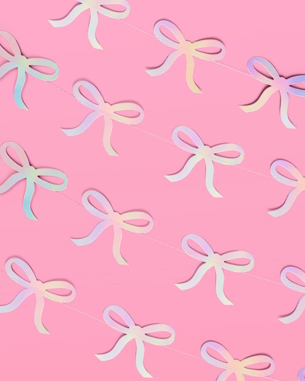 Glam pink bow garland with iridescent foil finish—4 strands, 12' each—perfect for adding sparkle to bridal showers, bachelorette parties, and baby showers.