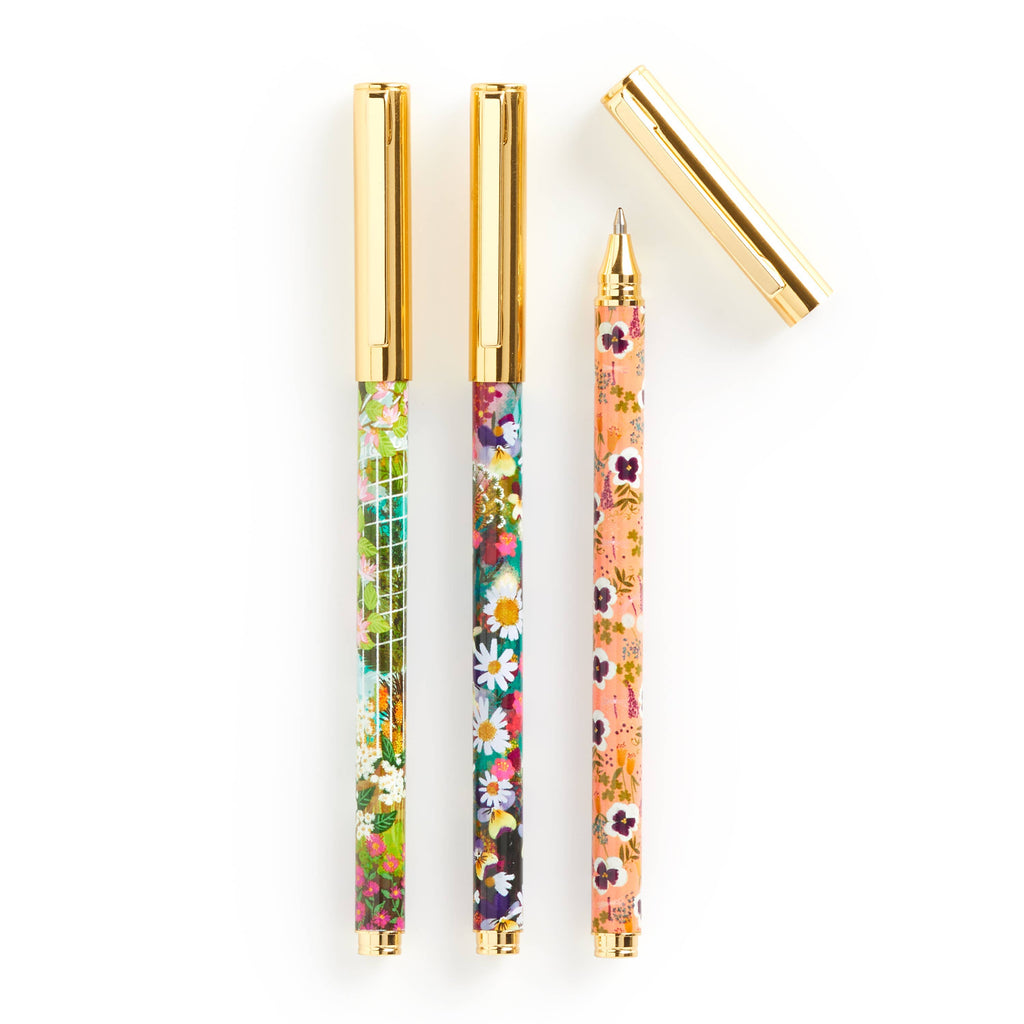 Close-up of vibrant floral illustrations on each pen barrel 