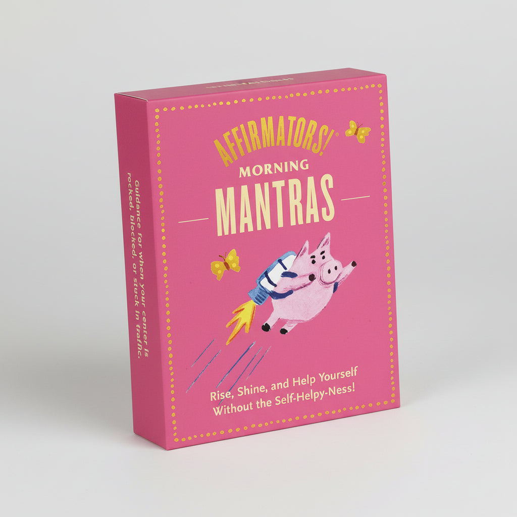 Pink book titled 'Morning Mantras' with a cartoon pig on the cover