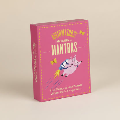 Pink book titled 'Morning Mantras' with a cartoon pig on the cover