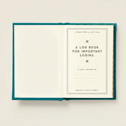 Open mini teal notebook with a log book for important logins on a white background