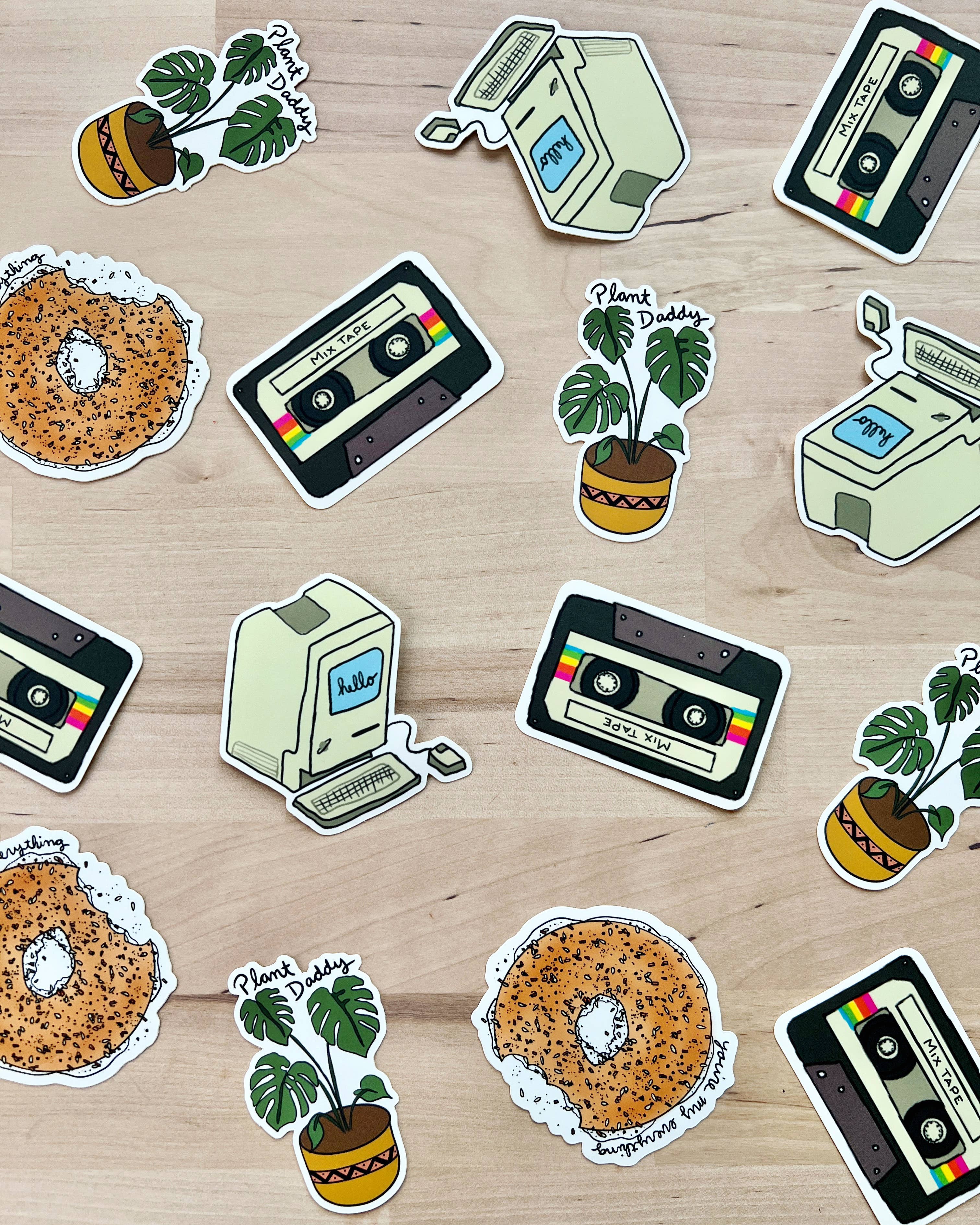 Bold Monstera vinyl sticker for plant enthusiasts mixed with other fun stickers