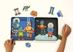 Child’s hands assembling robot pieces inside open tin