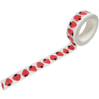 Roll of washi tape with strawberry pattern on a white background