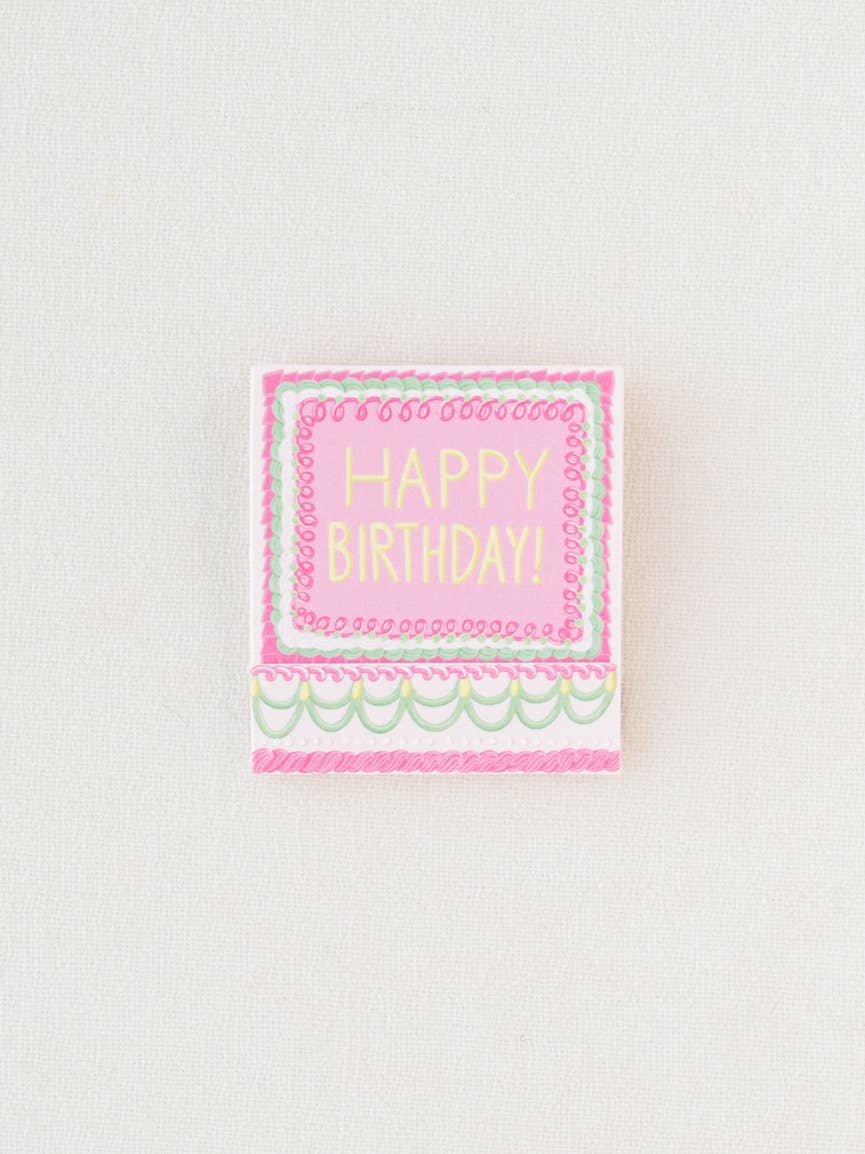 Close up of the matchbook closed, showing the front that says, "Happy Birthday".