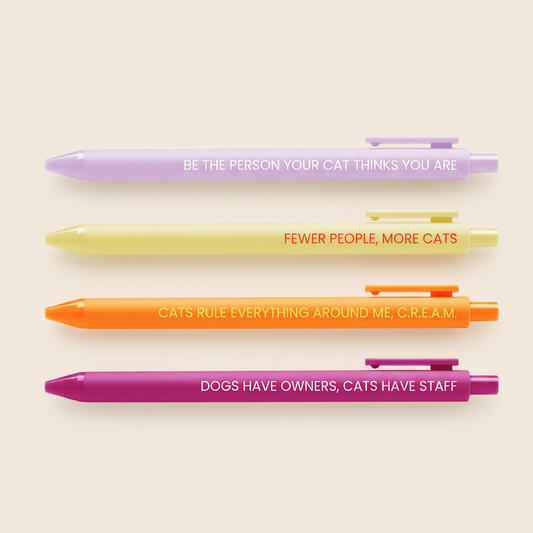 Four pens with humorous quotes for a cat person on a white background