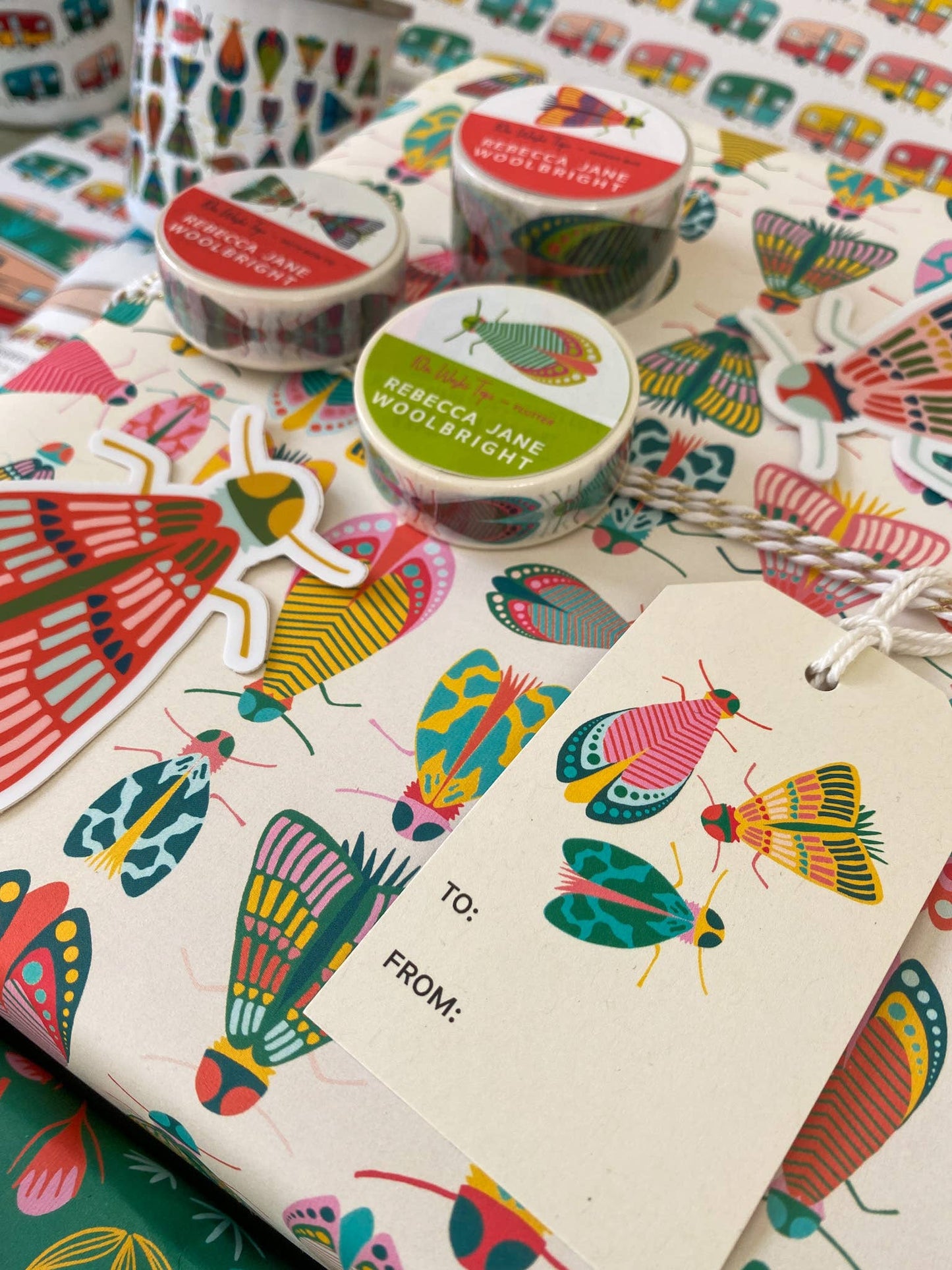 Gift Tags showcased along with other Dancing Bug stickers, washi tape, and fabric