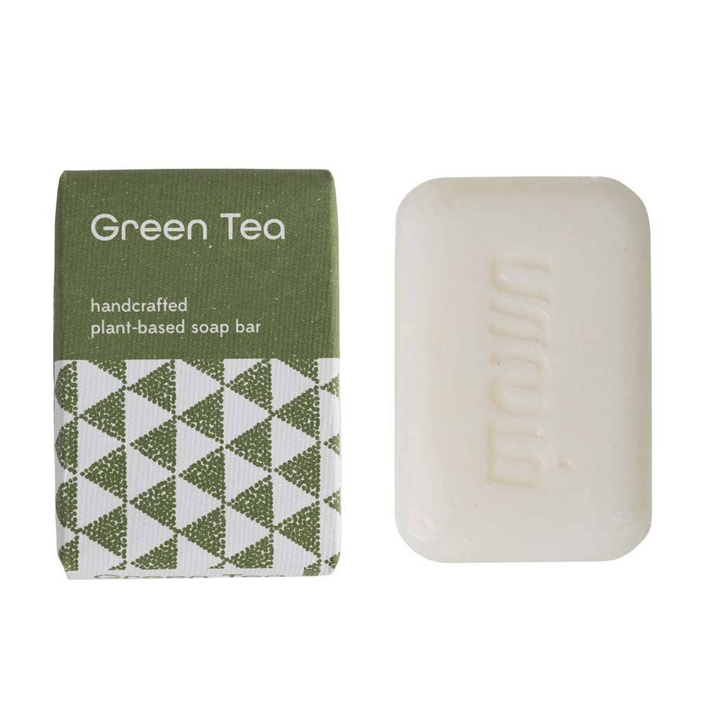 Handcrafted soap with eco-friendly packaging and soft green tones