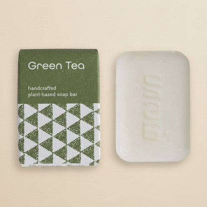 Handcrafted soap with eco-friendly packaging and soft green tones