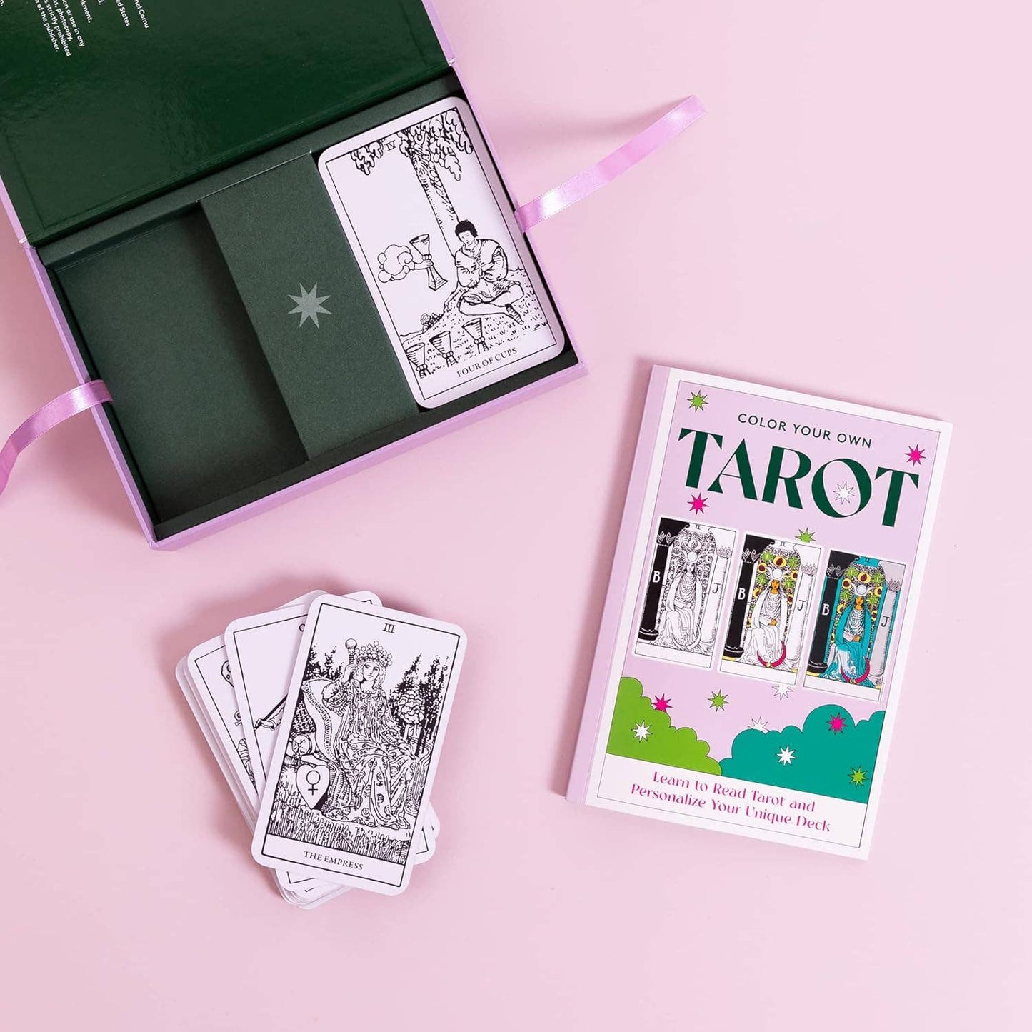 Color your own tarot card set with tarot cards and coloring book on a pink background