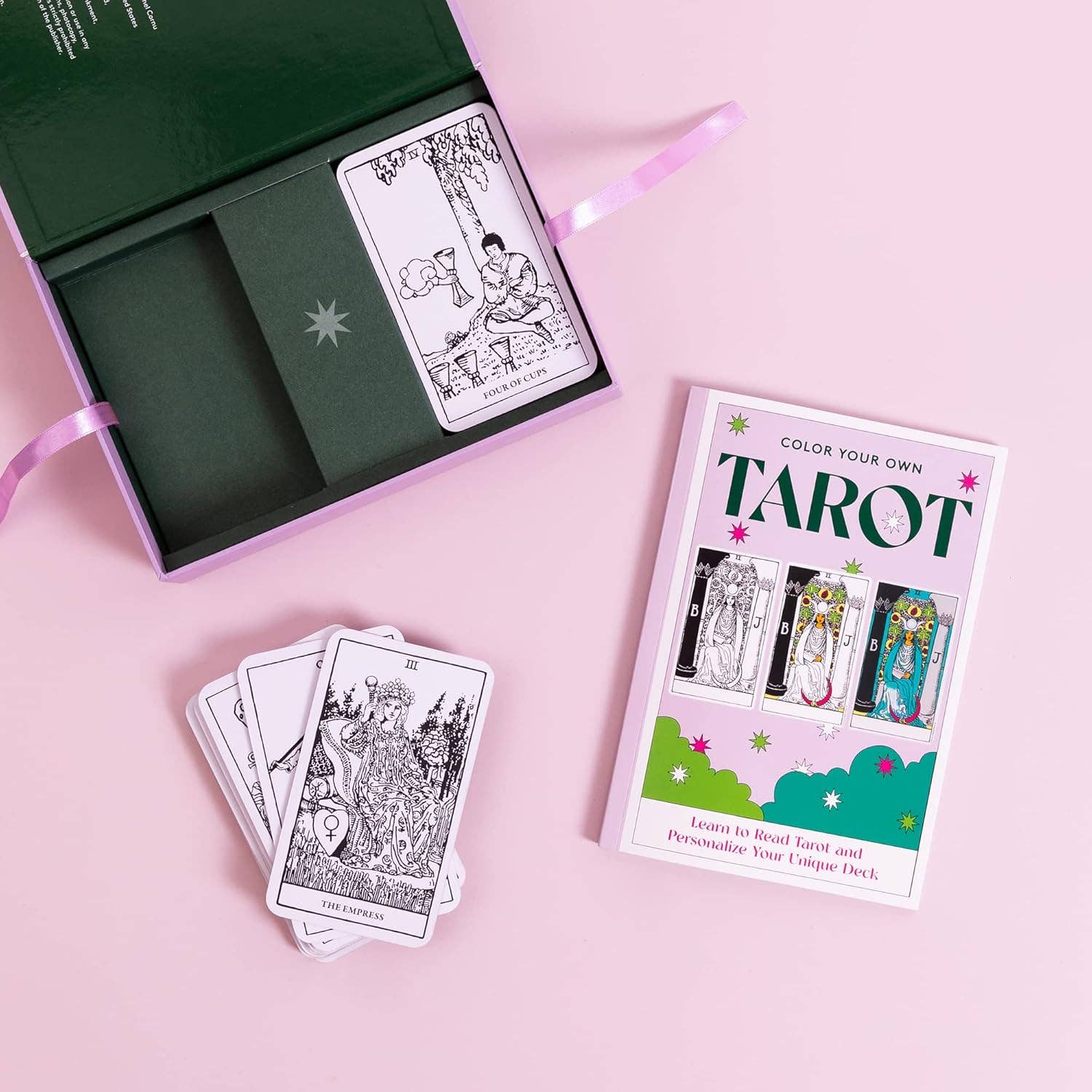 Color your own tarot card set with tarot cards and coloring book on a pink background