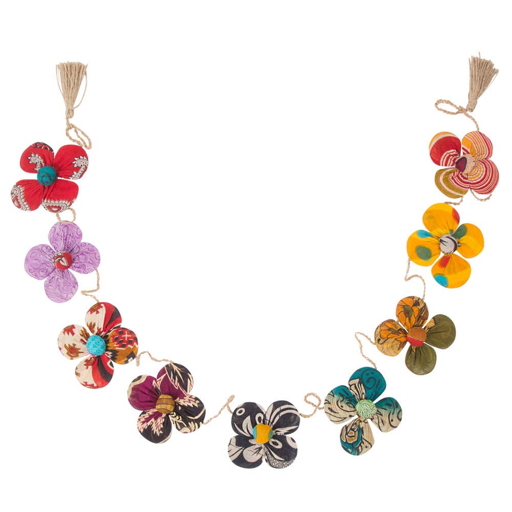 Close-up of handcrafted fabric flowers made from vibrant upcycled saris