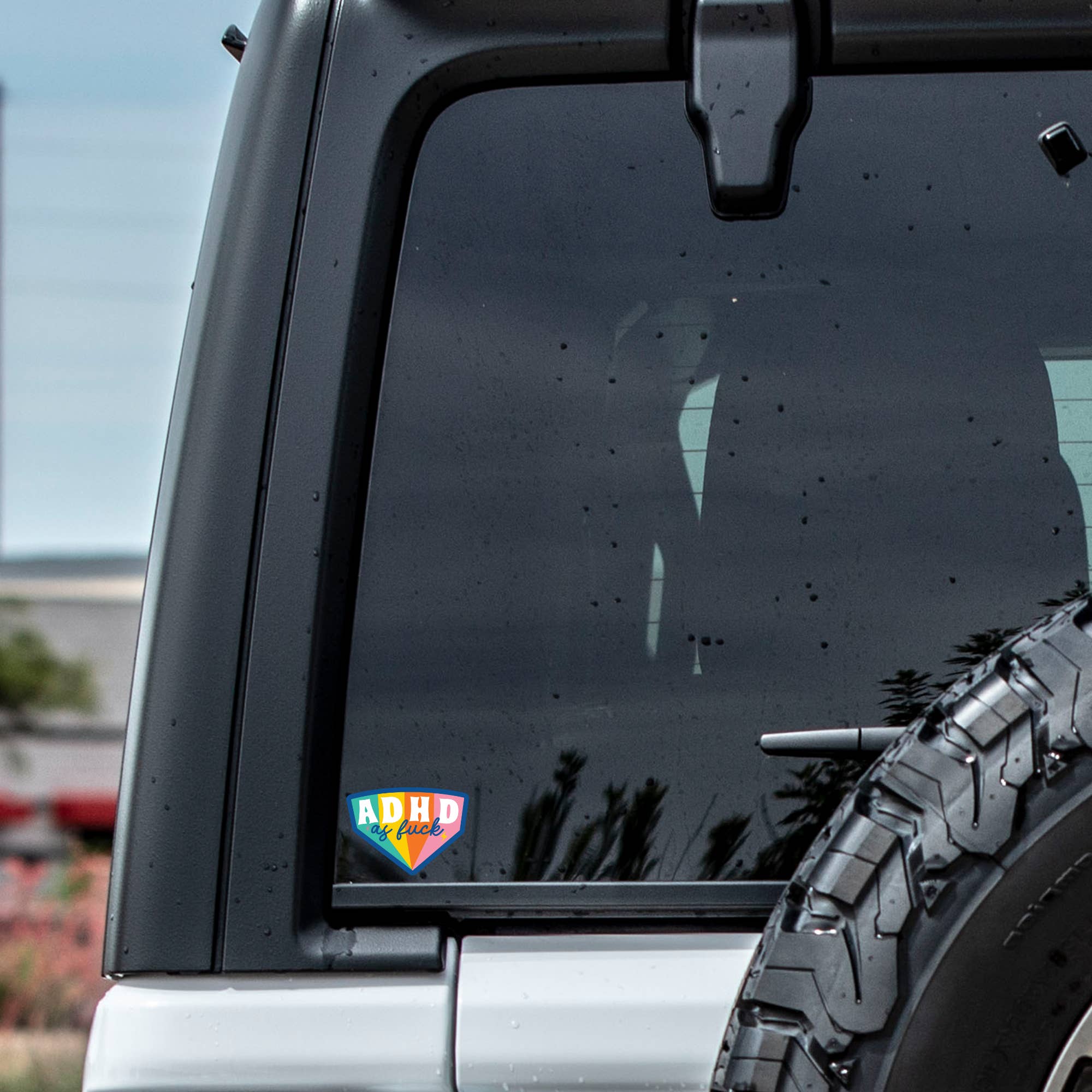 ADHD AF Sticker - Celebrate Neurodiversity decal on a vehicle.