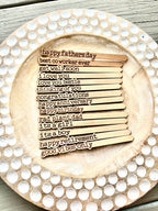 Set of engraved cherry hardwood plant sticks with heartfelt messages.