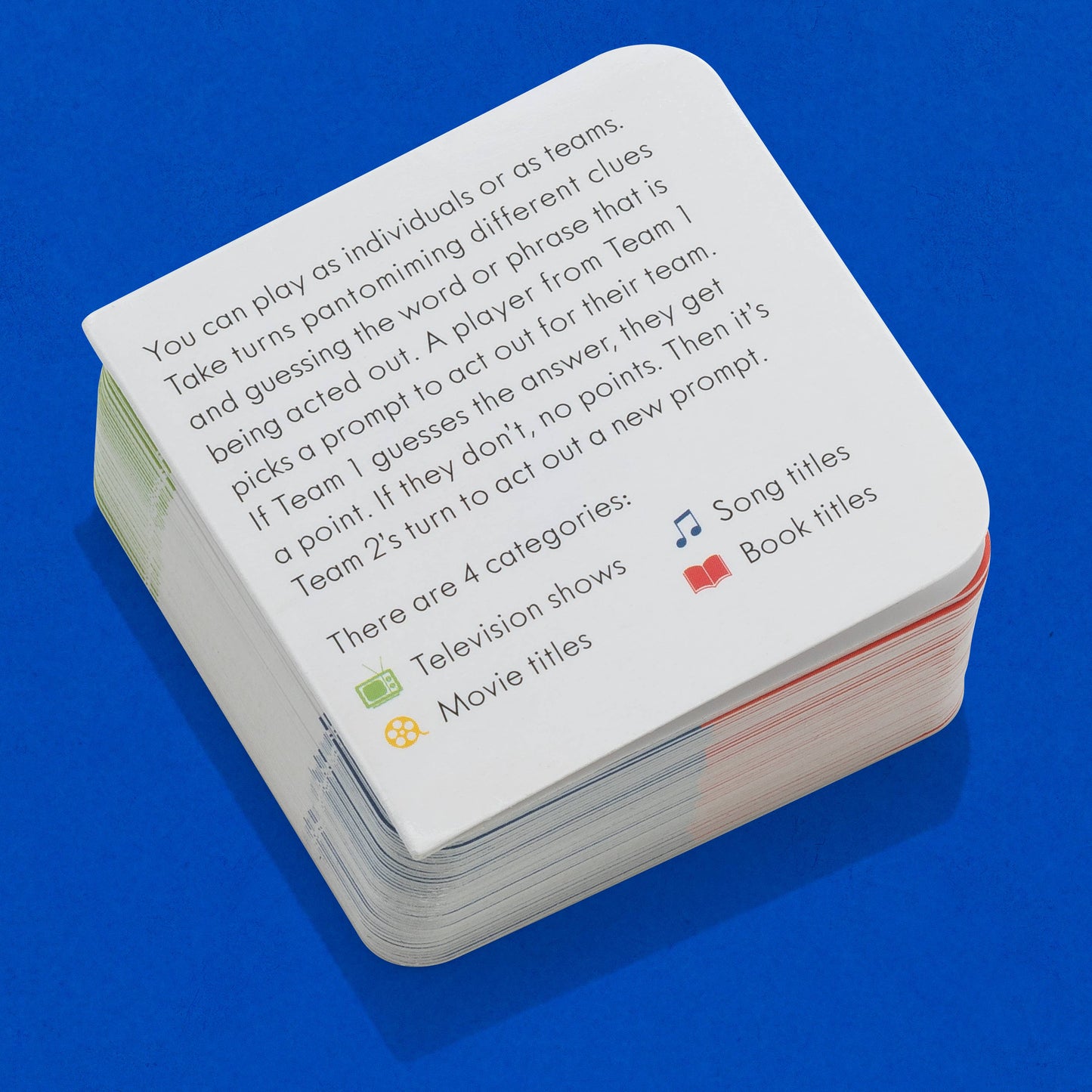 Stack of game cards with text on a blue background