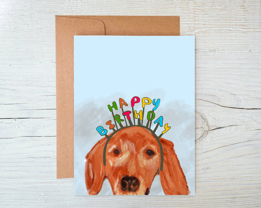 Golden Retriever wearing a birthday headband illustration on white card