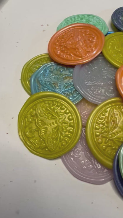 Video showcasing the mystical moth-themed wax stickers that evoke nature, magic, and cosmic beauty.