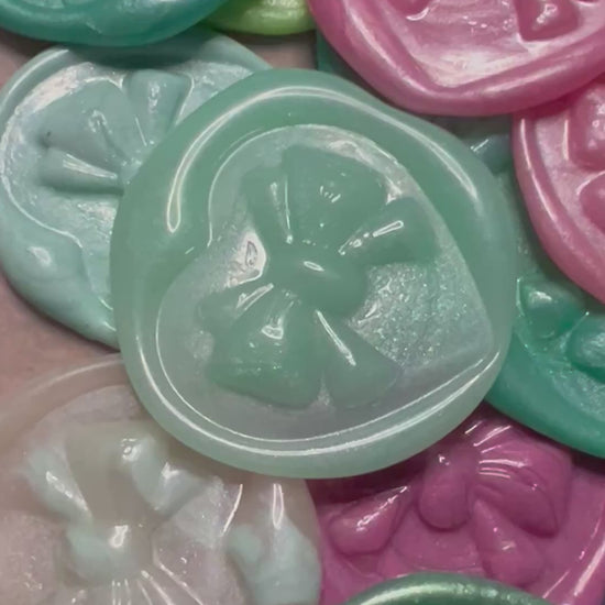 Sweet and sophisticated heart wax seals, ideal for adding elegance to special occasion letters.